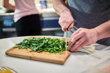 Couple cooking at home