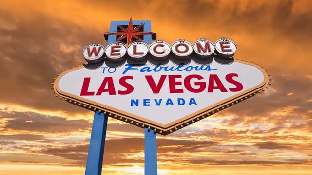 Welcome to fabulous Las Vegas sign with colorful sunset sky time lapse.
