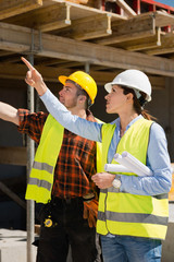 Architect and construction worker