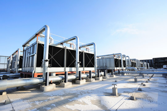 Sets of cooling towers in data center building.