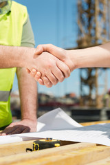 Construction site handshake