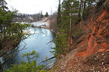 View from the cliff to the river. Clay rocks