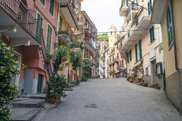 Fototapeta na wymiar Colorful houses in Manarola, Cinque terre Italy. 25.06.2015 -editorial use only