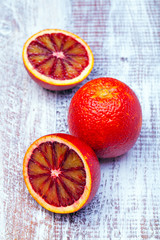 Sicilian orange isolated on a wood background