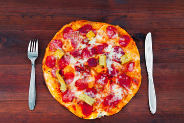 pizza on wood background