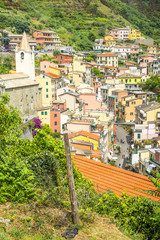 Fototapeta na wymiar Riomaggiore (Rimazuu), a village in province of La Spezia, Liguria, Italy. It's one of the lands of Cinque Terre, UNESCO World Heritage Site
