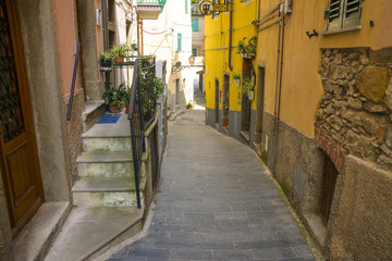 Fototapeta na wymiar Riomaggiore (Rimazuu), a village in province of La Spezia, Liguria, Italy. It's one of the lands of Cinque Terre, UNESCO World Heritage Site