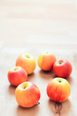Apples on a wooden background.