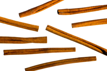 Cinnamon sticks on white background.