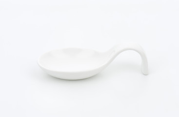 white porcelain spoon