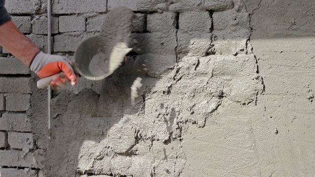 Sand and Cement Rendering on Brick Wall