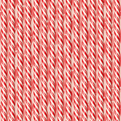 Realistic red candy canes on tablecloth. Seamless pattern