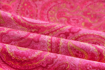 Red paisley background, cloth texture