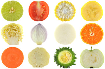 Halves of crop, fruits and vegetables on white background