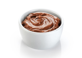 Bowl with chocolate butter isolated on white background.