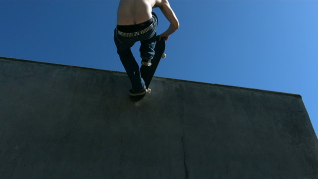 Skater does trick in air