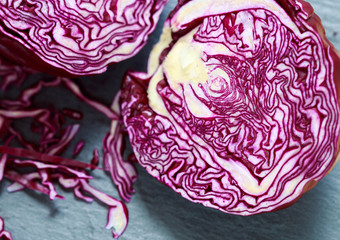 Obraz premium Fresh organic red cabbage on the black Board