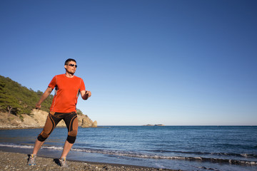 Running man in the summer in a beautiful location.