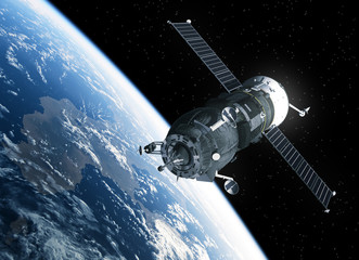 Fototapeta na wymiar Cargo Spacecraft Orbiting Earth. 3D Scene.