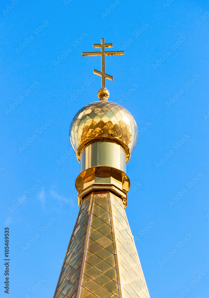 Canvas Prints Golden dome of Russian orthodox church with cross against blue s