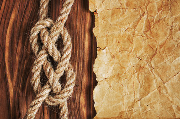 Fototapeta na wymiar Sailor's knot and old paper or map