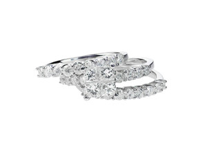 Diamond solitaire engagment wedding ring set isolated on white