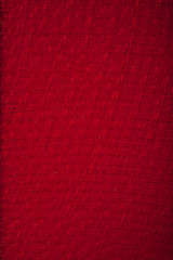 Fototapeta premium red carbon fiber texture, closeup view