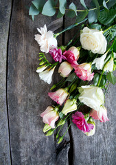 bouquet of beautiful flowers on wooden surface