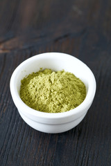 macha tea on wooden surface