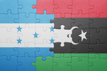 puzzle with the national flag of honduras and libya