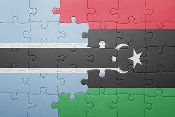 puzzle with the national flag of botswana and libya