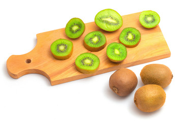 Isolated kiwi fruits on cutboard.
