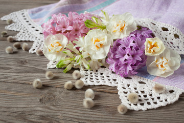 Spring flowers hyacinth and daffodils on table