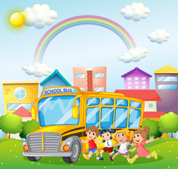 Children and school bus in the park