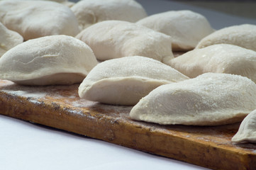 Dumplings are hired prepared for cooking in hot water