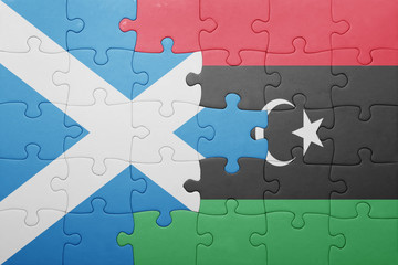 puzzle with the national flag of scotland and libya