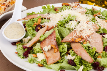 lettuce salad with ham and Parmesan cheese