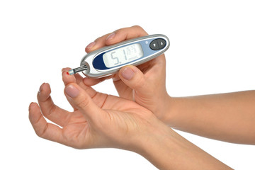Diabetes composition glucometer in hand for measuring glucose le