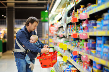 Father and his son at supermarket