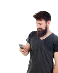 Handsome boy with long beard and a mobile