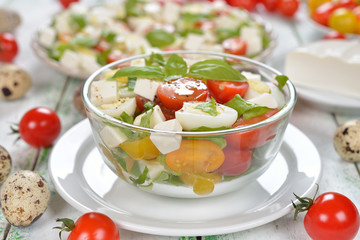 Salad with cherry tomatoes, eggs and cheese