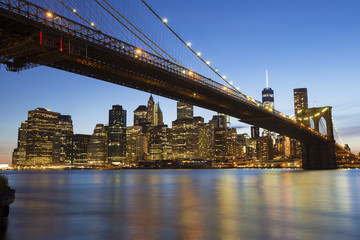 Fototapeta na wymiar Brooklyn Bridge at dusk viewed from the Brooklyn Bridge Park in New York City.