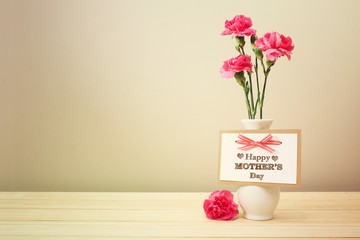 Mothers day message with pink carnations