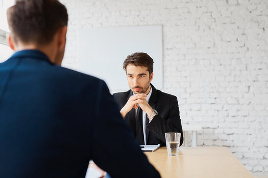 Recruiter listen to candidate during job interview
