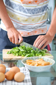 Man preparing ingredients for a healthy meal
