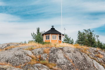 Finnish Weather Station On Rock In Island in Finland