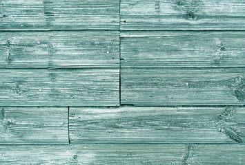 Navy blue weathered wooden wall texture.
