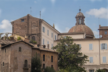 Fototapeta na wymiar Roman architecture with a dome of a church, Italy