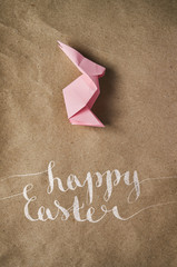 Pink bunny on eco craft paper background