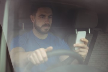 Delivery man driving his van